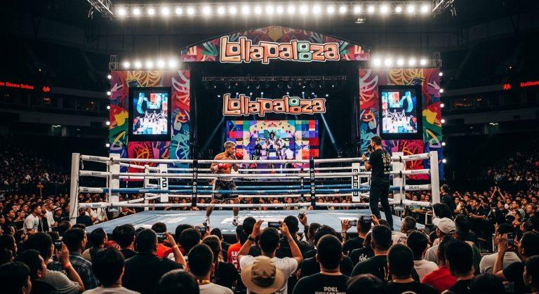 Boxing ring beside a large festival stage with Lollapalooza branding and a Filipino audience.
